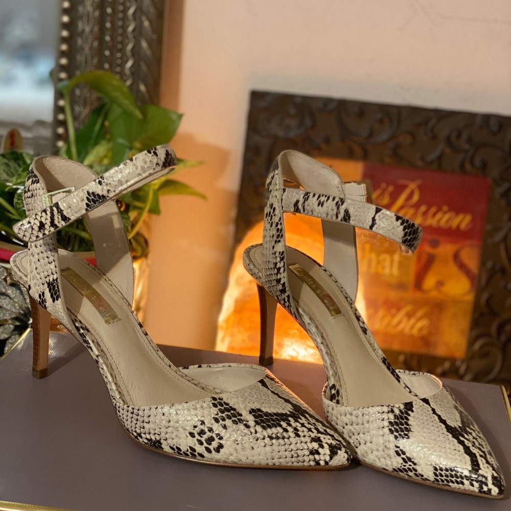 Size 5 snake print heels. Almost new